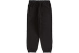 Pantalon de survêtement Supreme noir porté style streetwear