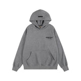 fear of god essentials tracksuit gris foncé détail logo